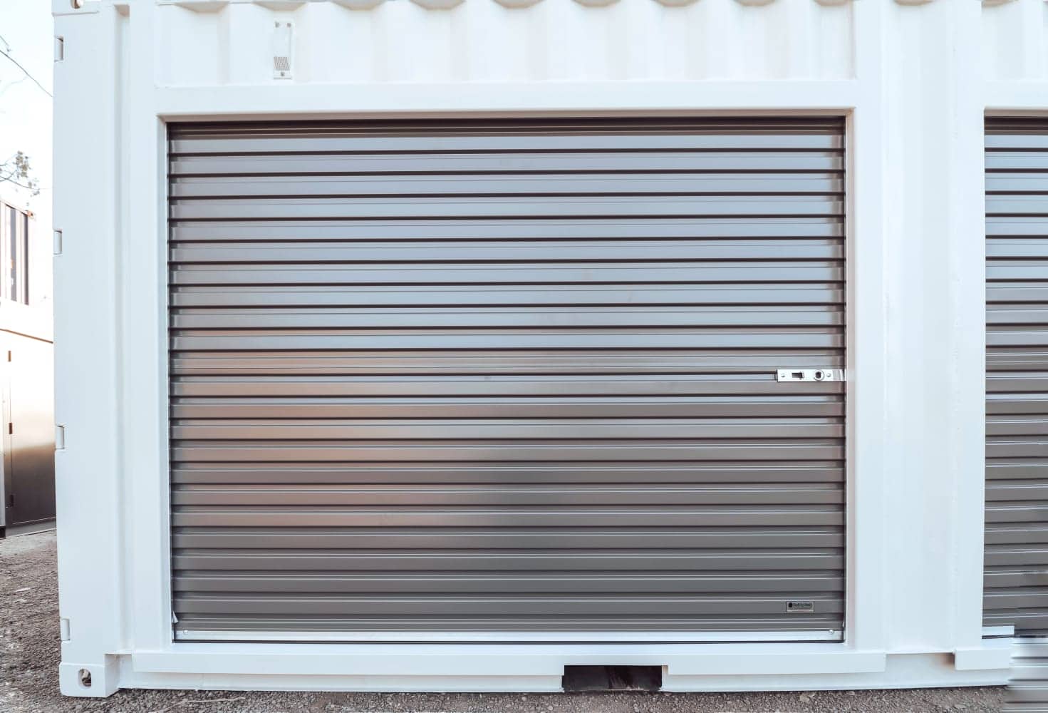 20&prime; Shipping Container + (2)  8&prime; Rollup Doors - Backstorage Containers LLC